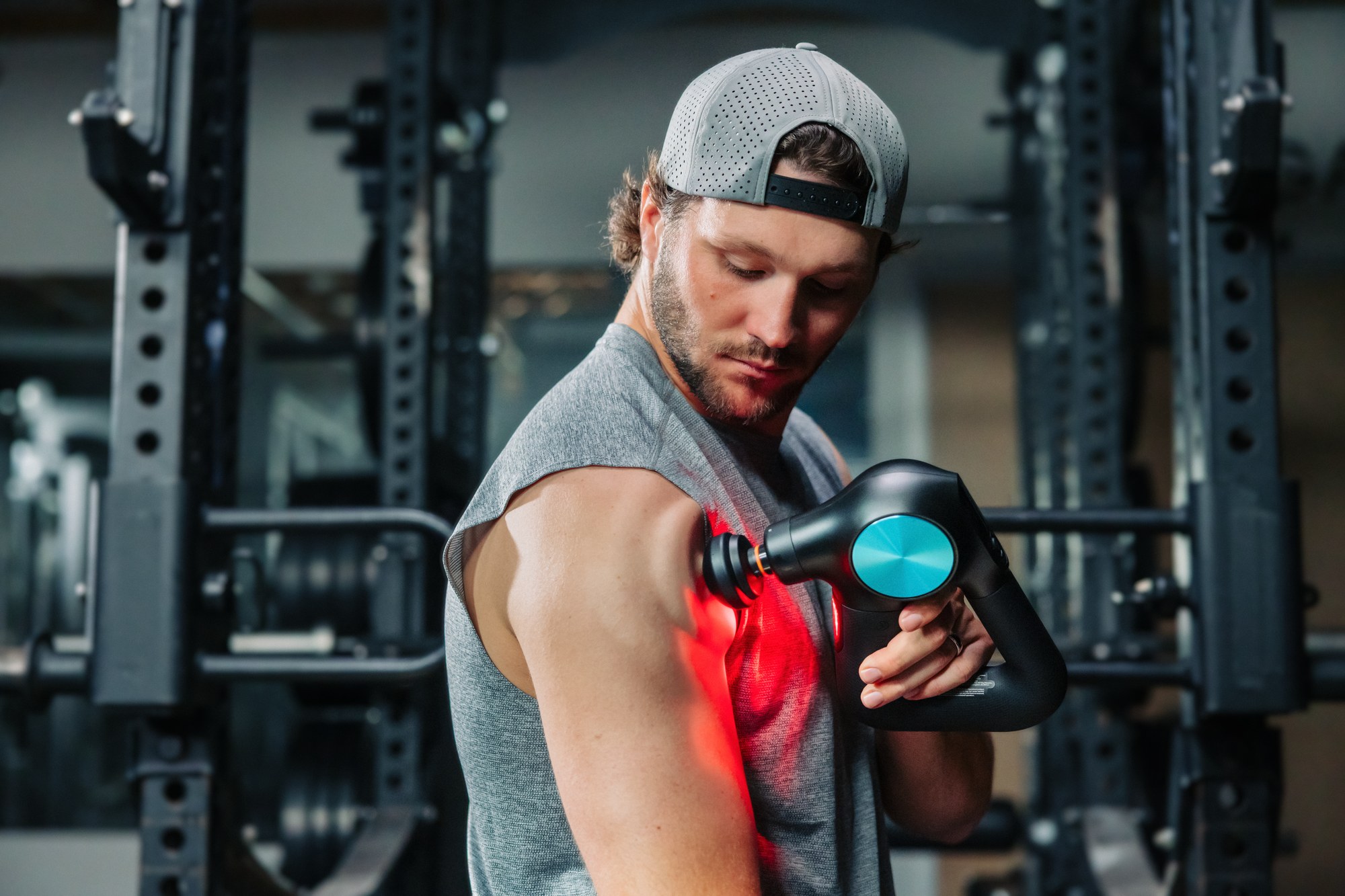 Josh Allen training with a Therabody recovery device