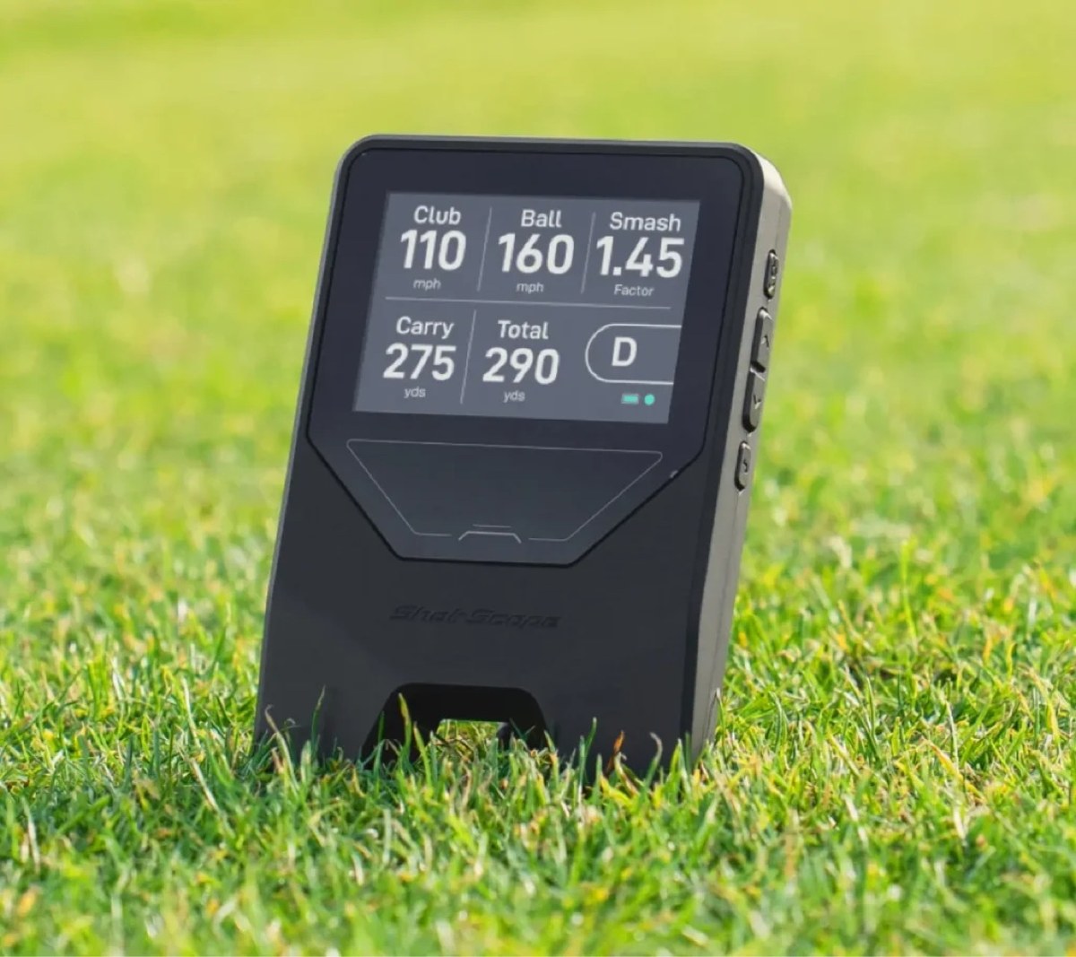 Shot Scope LM1 launch monitor on a golf course